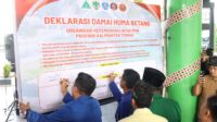 Deklarasi Damai Huma Betang bersama pemuda lintas iman di Palangka Raya untuk memperkuat persatuan dan kerukunan.