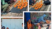 Personel Ops Damai Cartenz belanja hasil bumi di Paniai Timur, Papua Tengah.