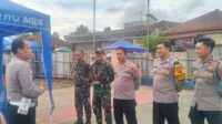 Polsek Cikijing dan Koramil 1705 mengamankan pertandingan sepak bola SU-CI Cup 2025 di Desa Cikijing,